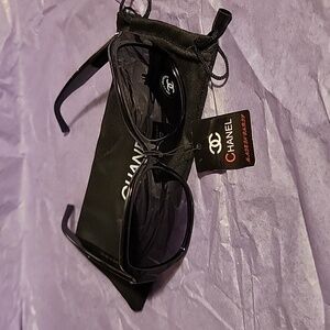 Chanel Sunglasses with dark purple lenses